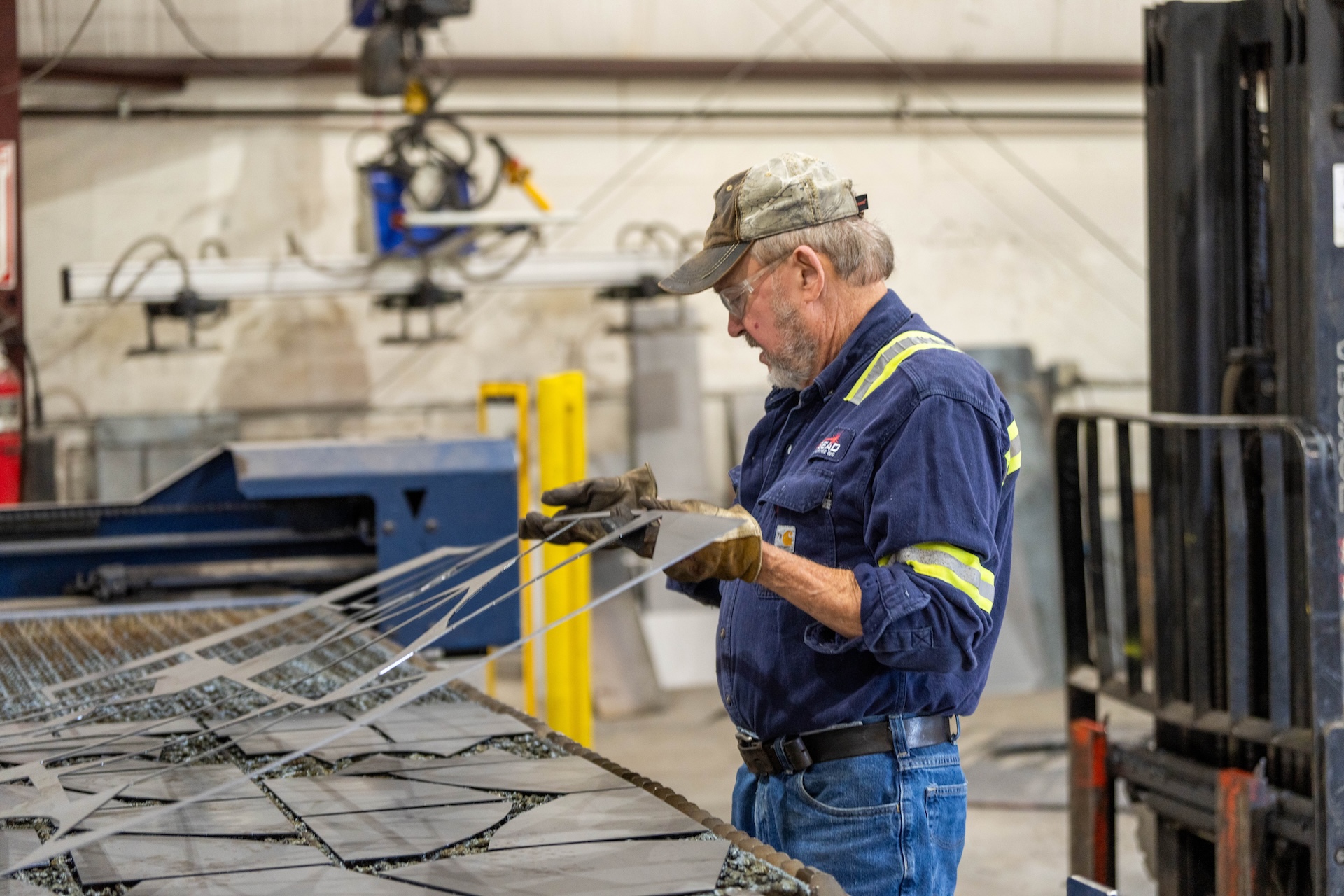 Top Bead Welding employee fabricating metal