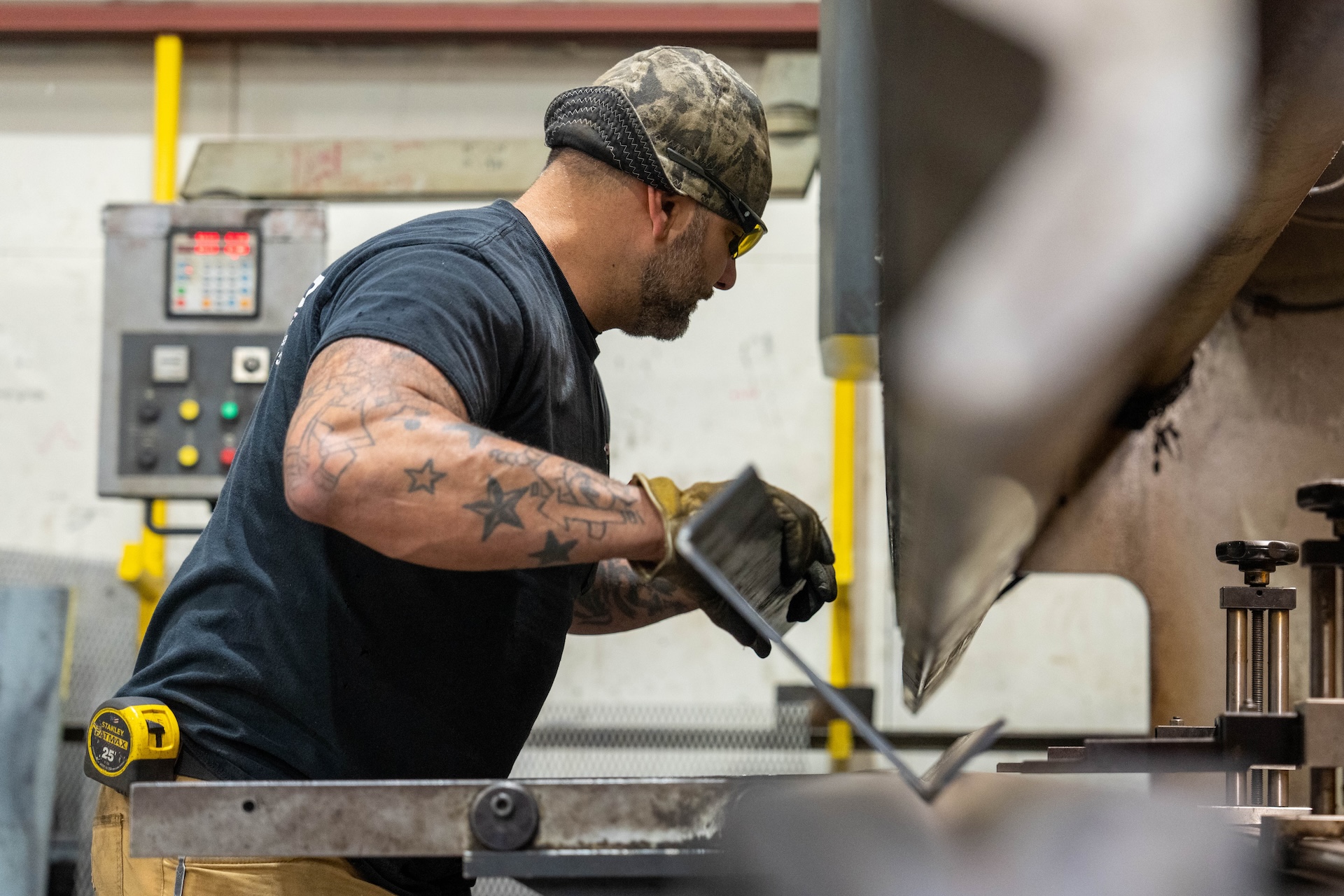 Top Bead Welding employee using machinery