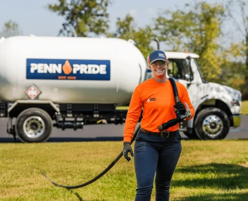 Penn Pride employee preparing to fill propane for a customer