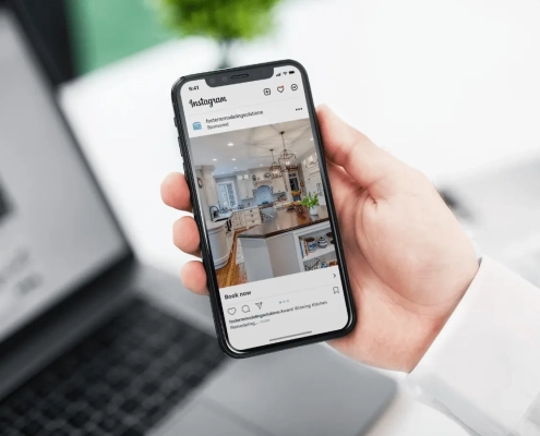 Smartphone displaying an Instagram ad for a local remodeling company.