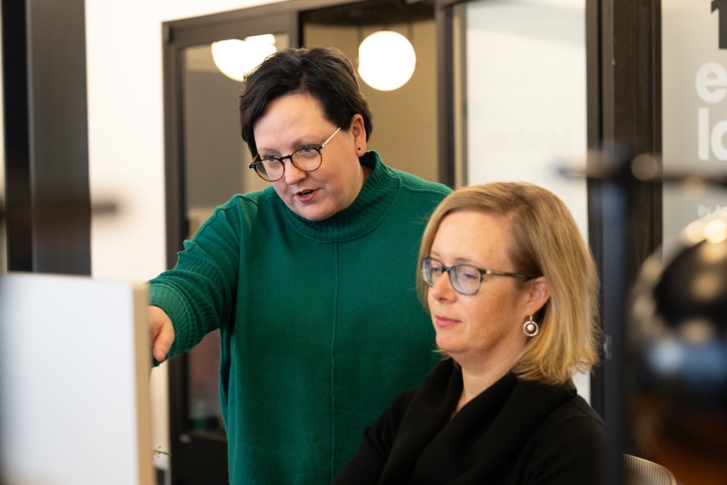 Vada, Founder and CEO of Estland, gives creative direction to Mary, Estland's Client Success director.
