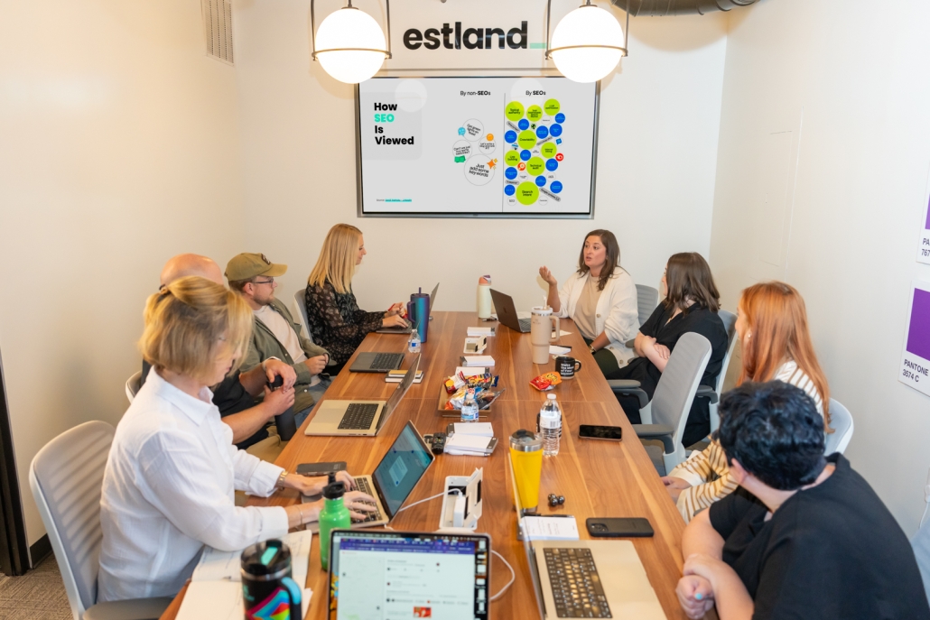 The Estland team reviewing the latest AEO trends for website optimization